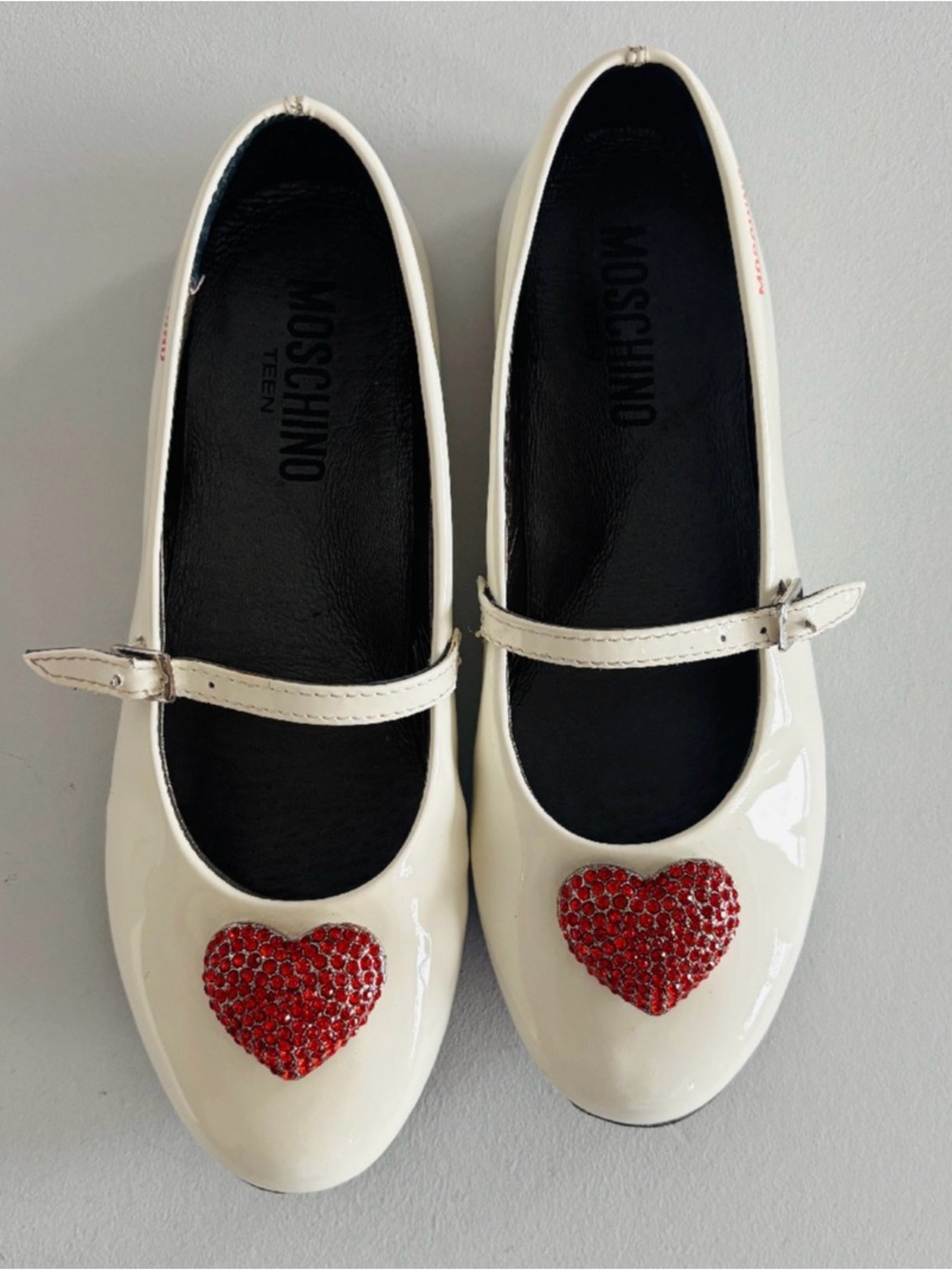 Moschino Cream Patent Mary Jane Flats with Red Crystal Heart Appliqués